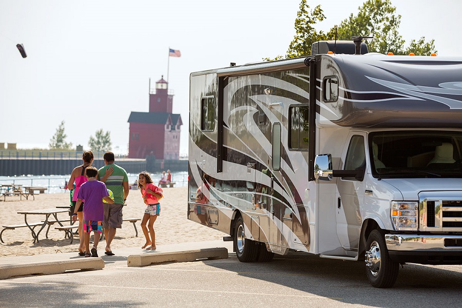 Family RVing at beach